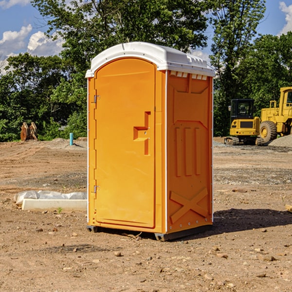 how often are the portable restrooms cleaned and serviced during a rental period in Topinabee MI